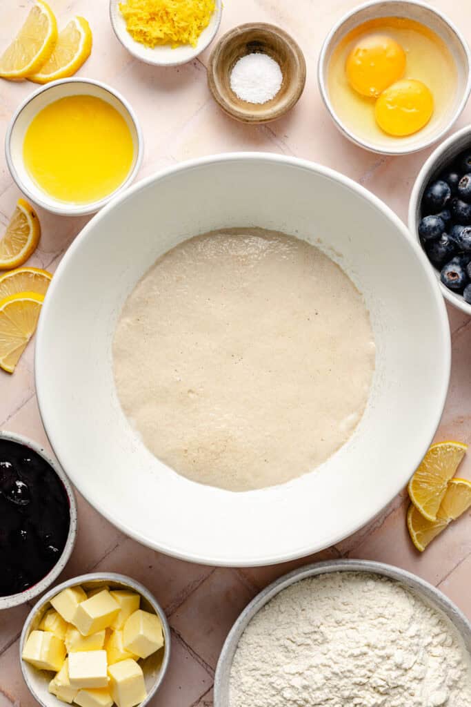 yeast and milk in mixing bowl