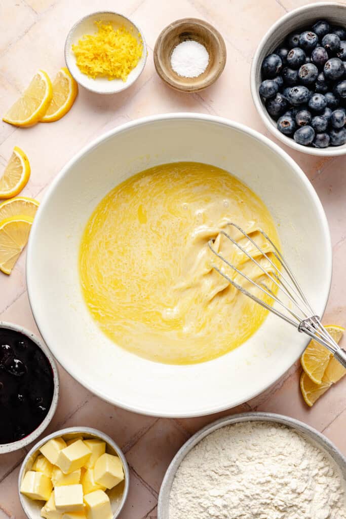 wet ingredients being whisked together