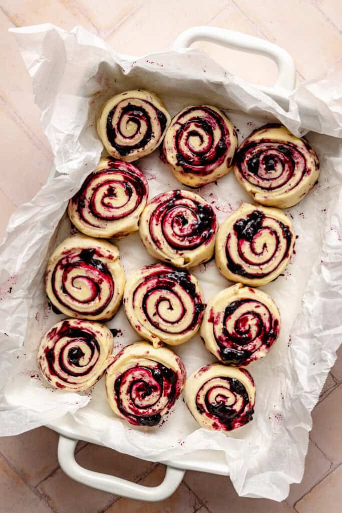 sweet rolls in baking dish for first rise