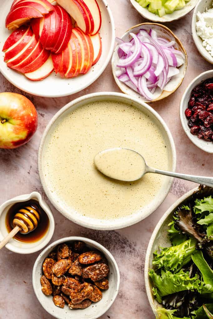 dressing in bowl with spoon