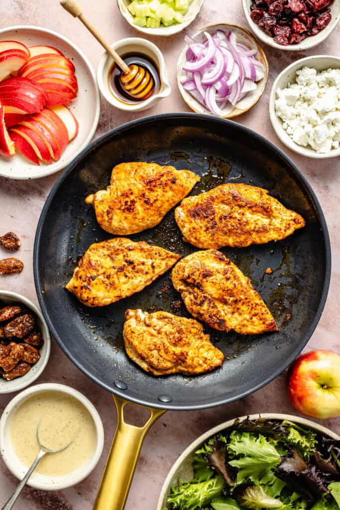 chicken cooking in skillet