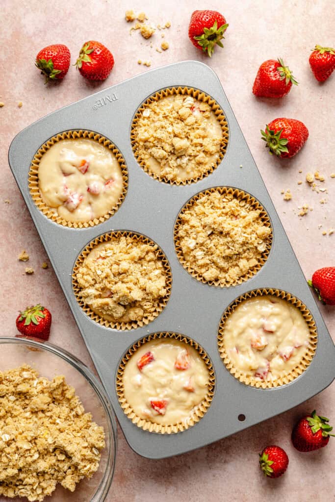muffin batter and crumble in muffin pan