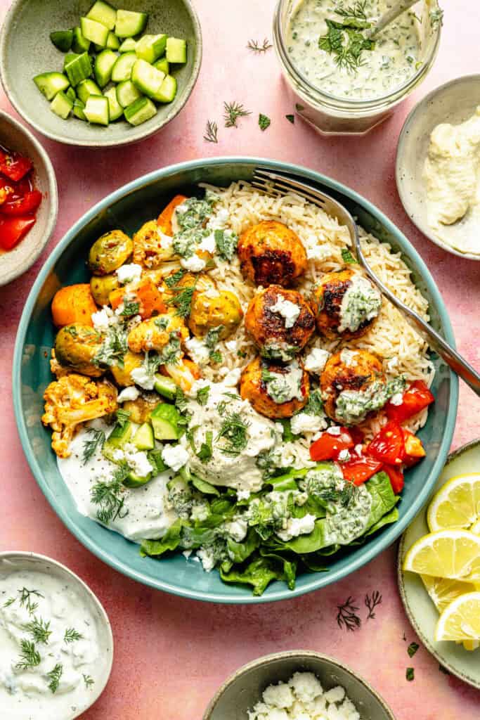 meatballs in bowl with toppings