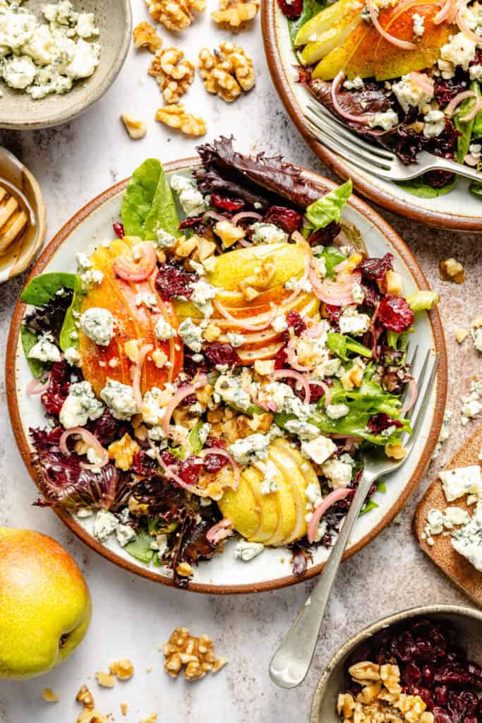 pear and blue cheese salad on plate with fork