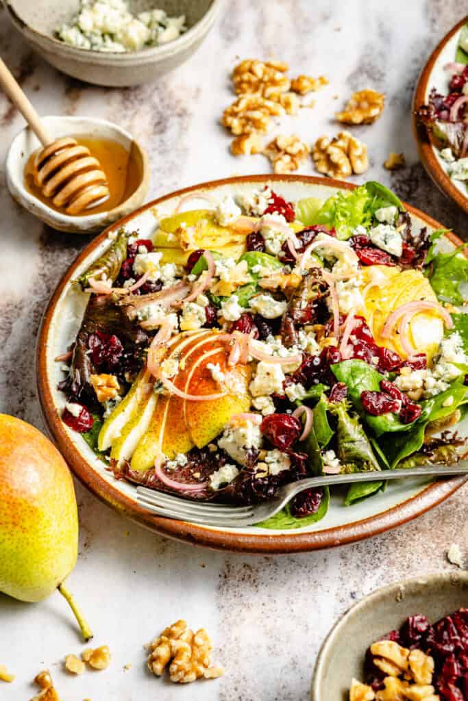 pear and blue cheese salad on plate with fork