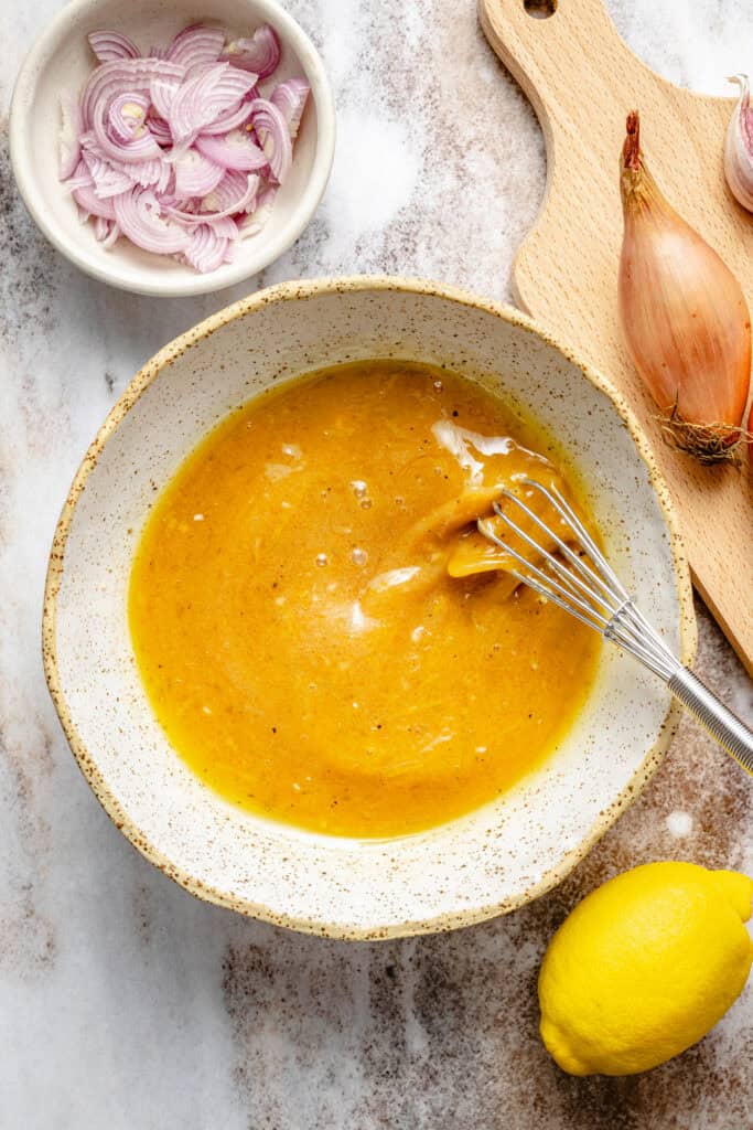 whisking together dressing