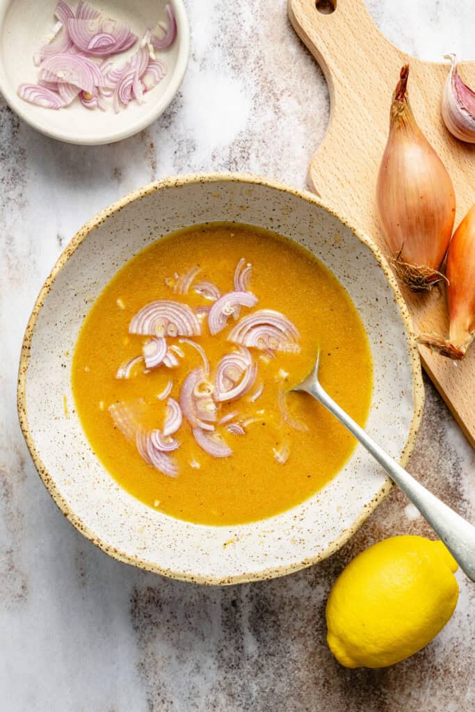 shallots being added to bowl
