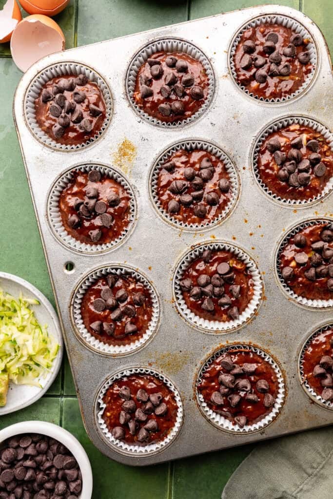 muffin batter in baking pan