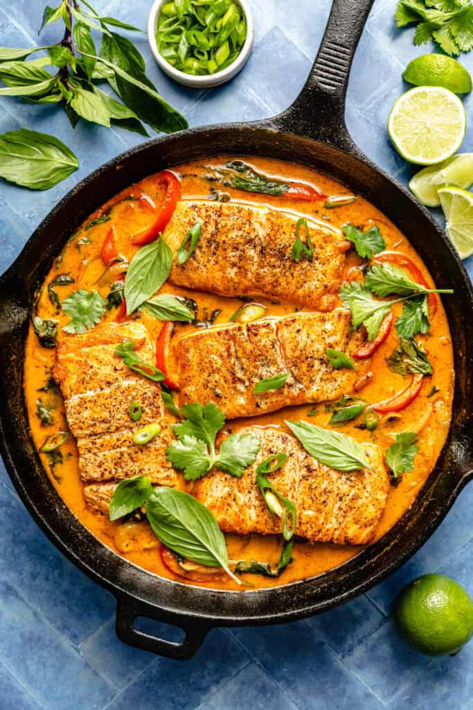 curry salmon in pan