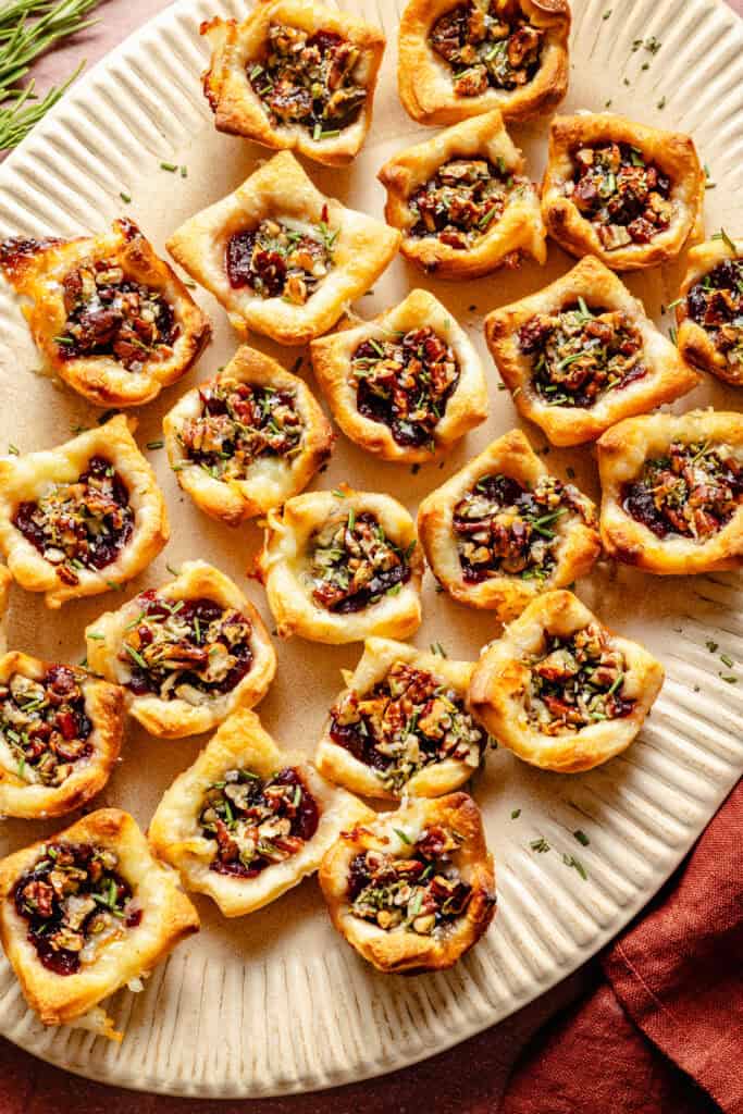 cranberry brie bites on platter