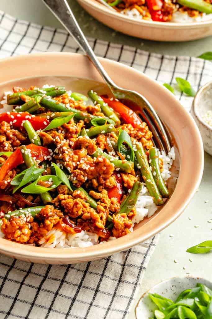gochujang chicken bowl with fork