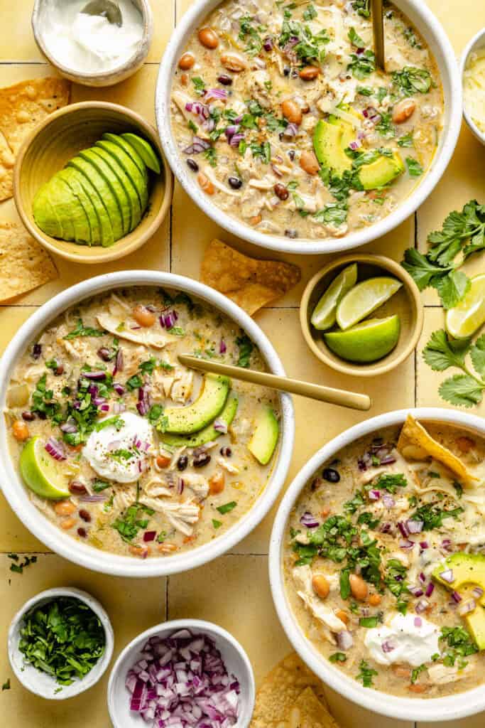 two bowls of green chicken enchilada soup