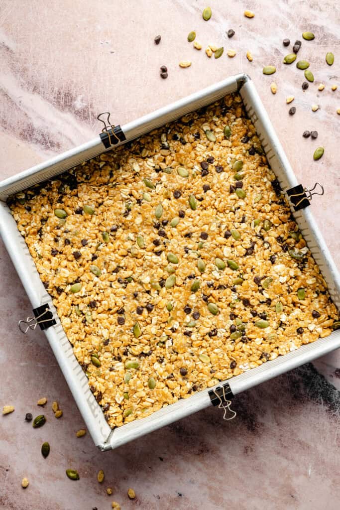 granola bar mixture in pan