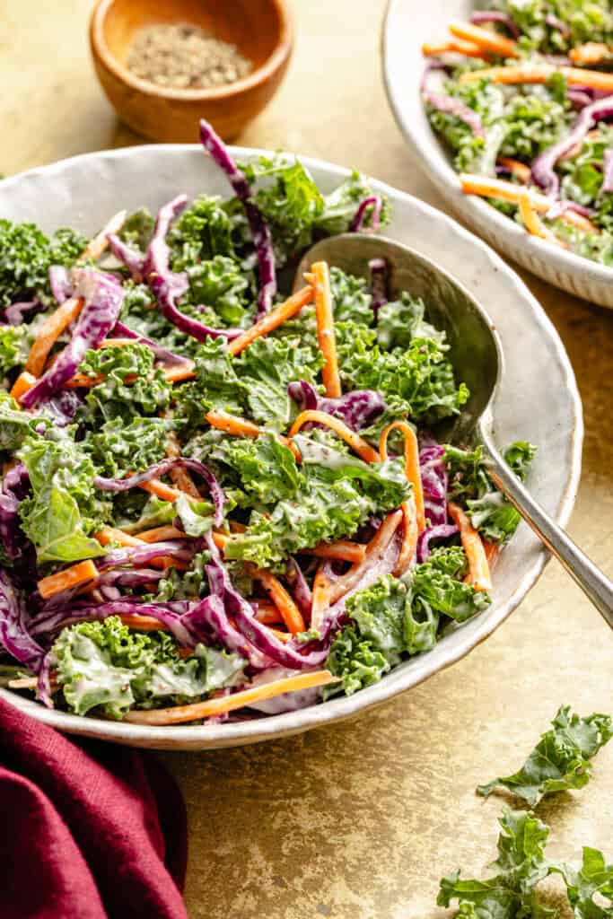 kale slaw in bowl with spoon