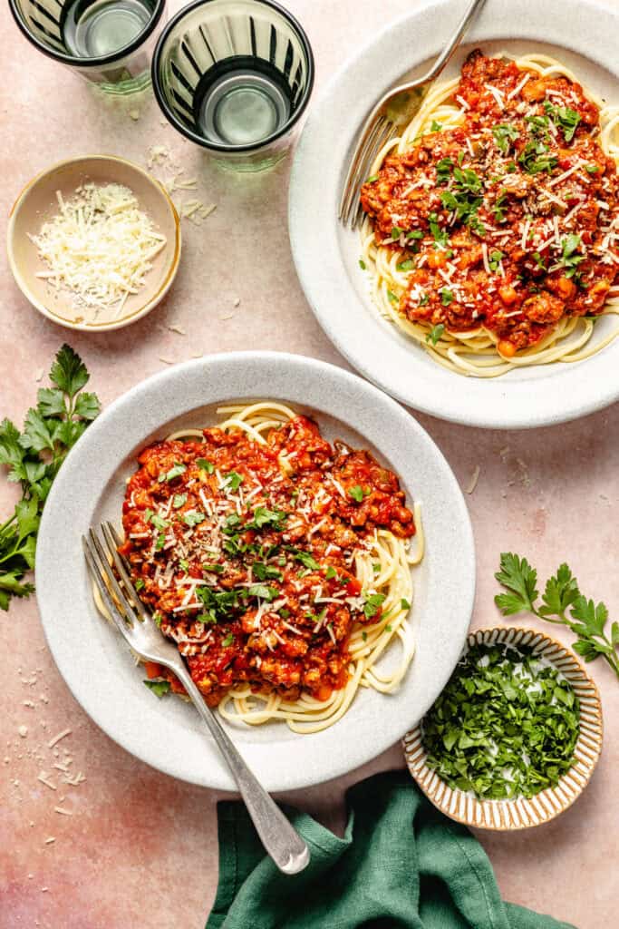 spaghetti sauce over noodles