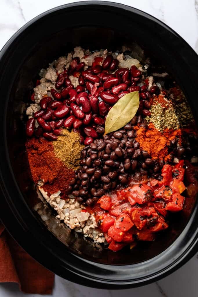 chili ingredients in slow cooker