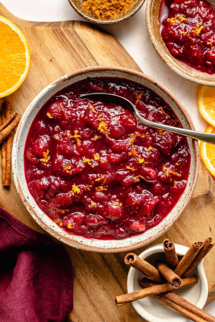 homemade cranberry sauce in bowl with spoon