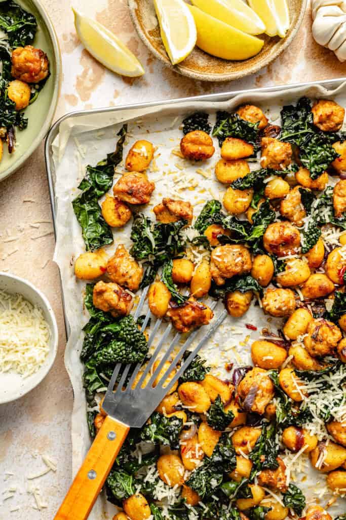 sheet pan gnocchi dish on sheet pan with spatula