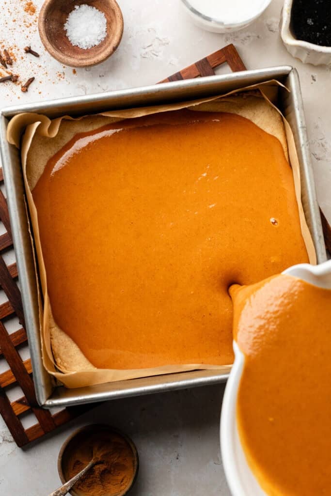 sweet potato pie filling poured over crust