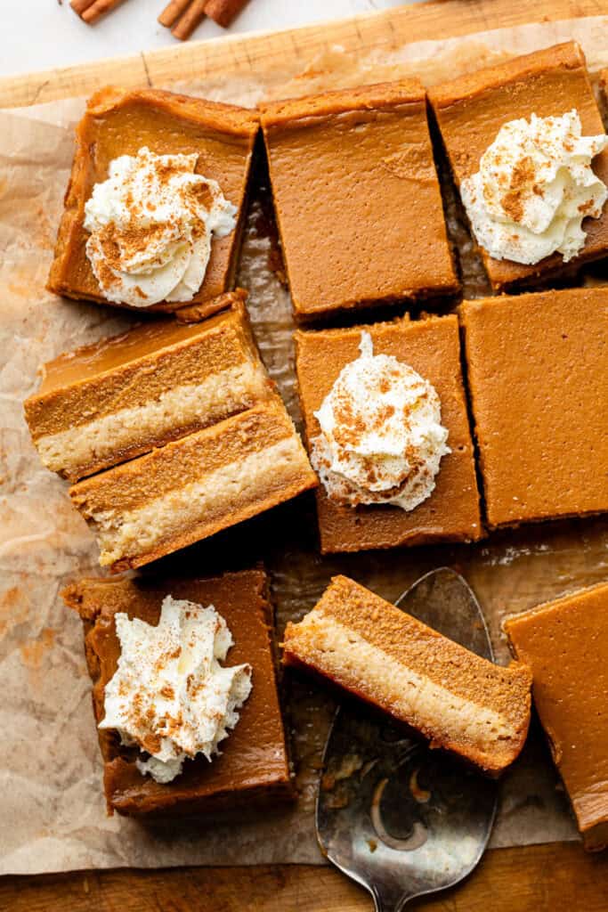 sweet potato pie bars sliced with whipped cream