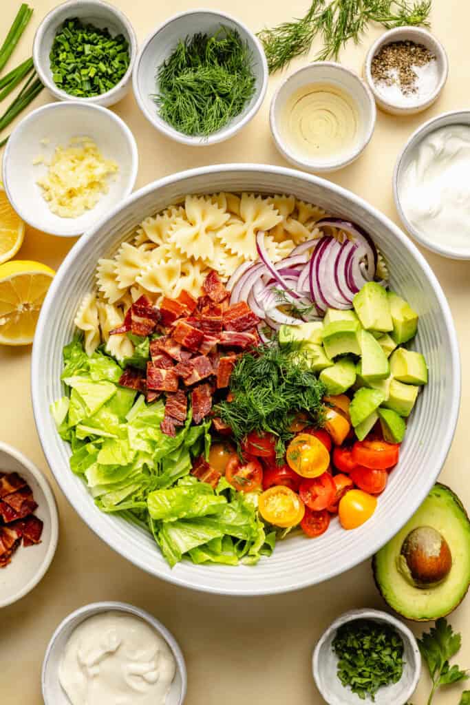 blt pasta salad ingredients in mixinb bowl