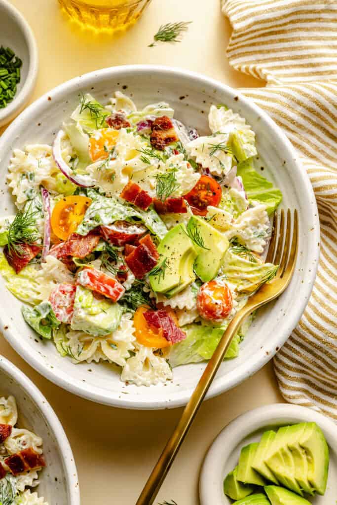 blt pasta salad in bowl with fork