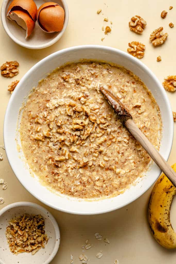 banana baked oatmeal batter in mixing bowl