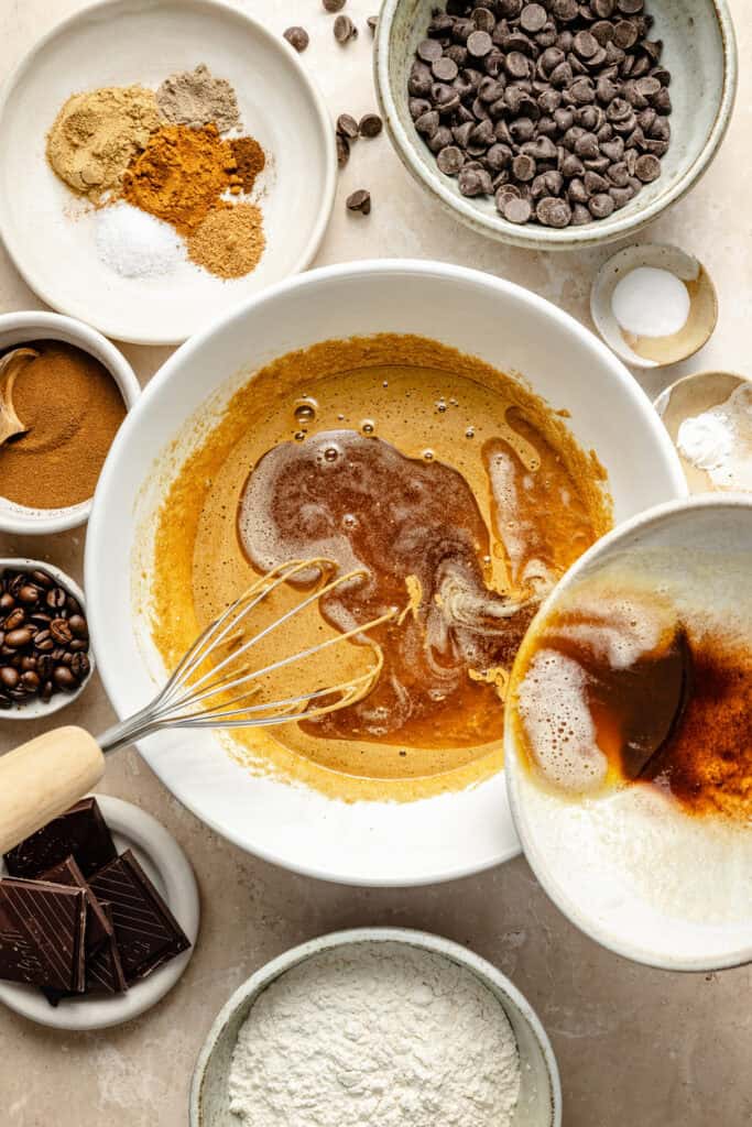 brown butter being poured into batter