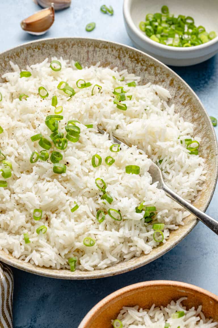 coconut rice in bowl with fork