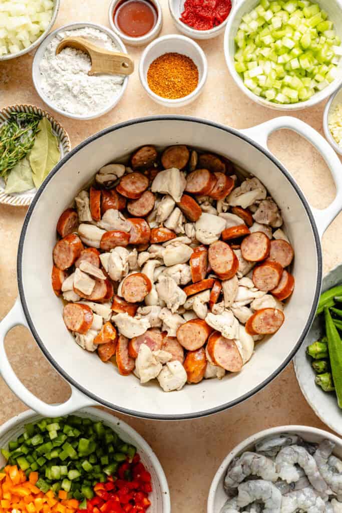 chicken and sausage in pot