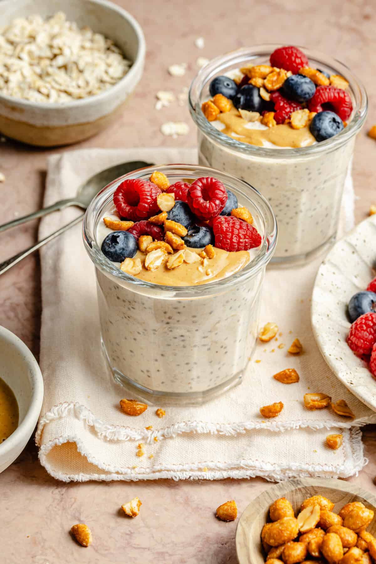 peanut butter overnight oats topped berries and peanut butter