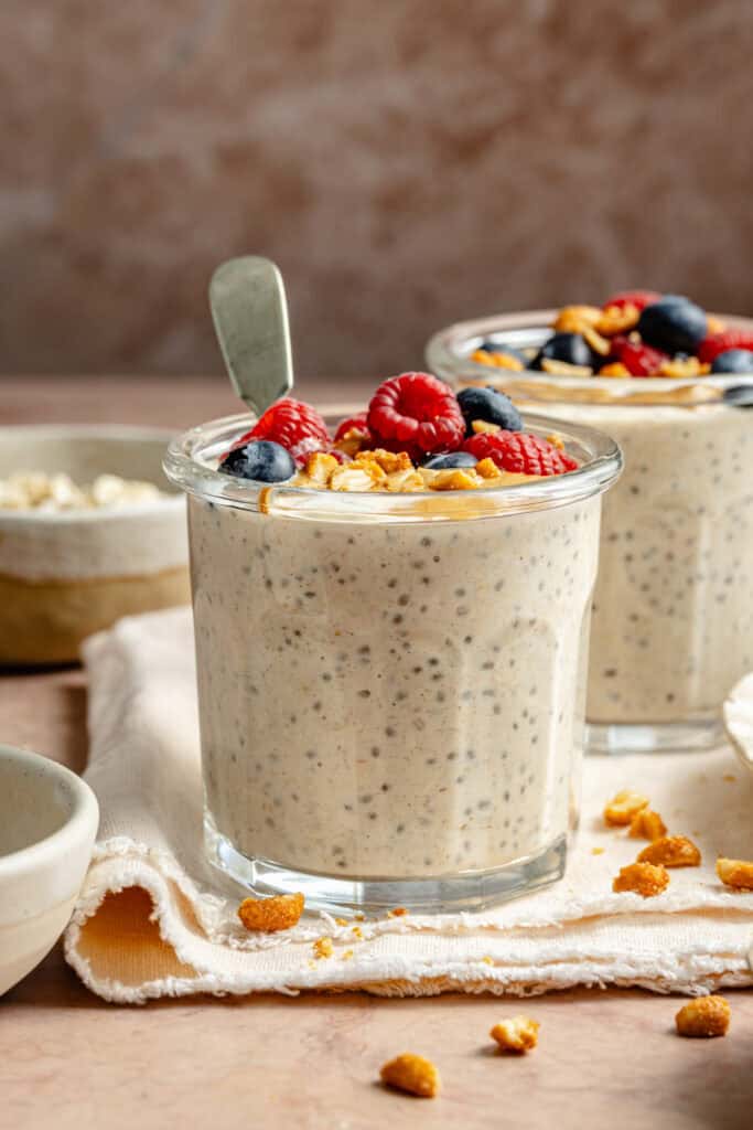 peanut butter overnight oats topped berries and peanut butter