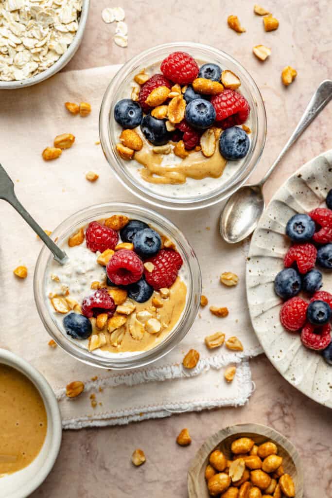 peanut butter overnight oats topped berries and peanut butter