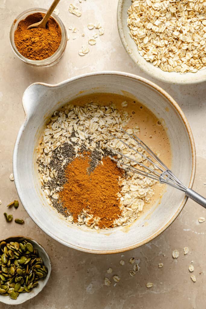 dry ingredients being added to wet mixture