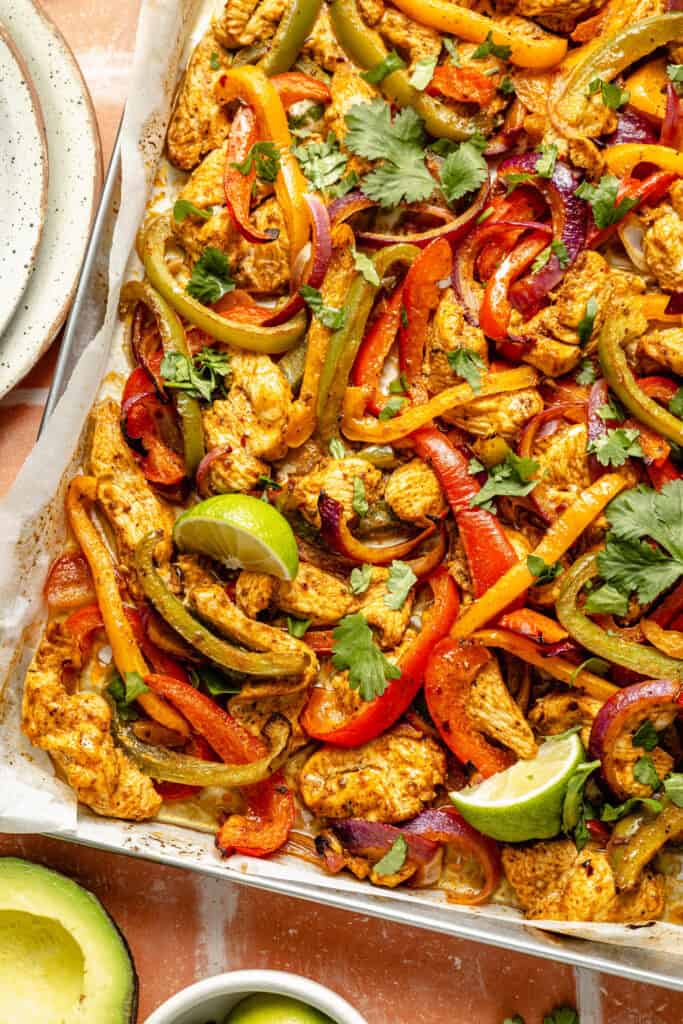sheet pan chicken fajitas on pan