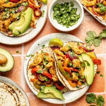 sheet pan chicken fajitas served in tortillas
