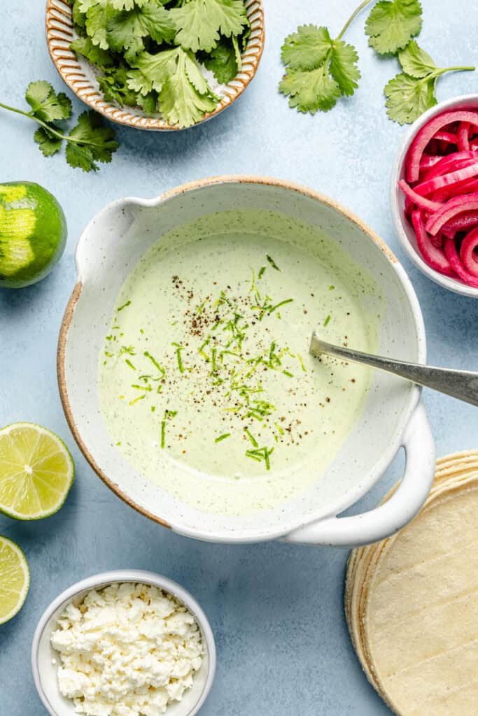 lime crema in bowl with spoon