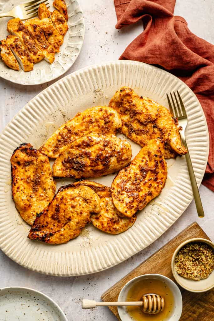 air fryer chicken breast on plate with fork