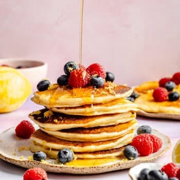 lemon ricotta pancakes with fresh fruit and syrup