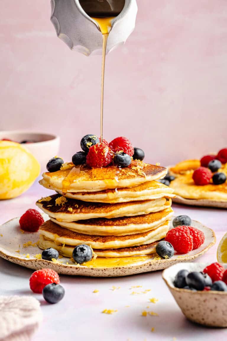 lemon ricotta pancakes with fresh fruit and syrup