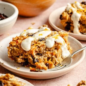 carrot cake baked oatmeal on plate with ceam cheese icing