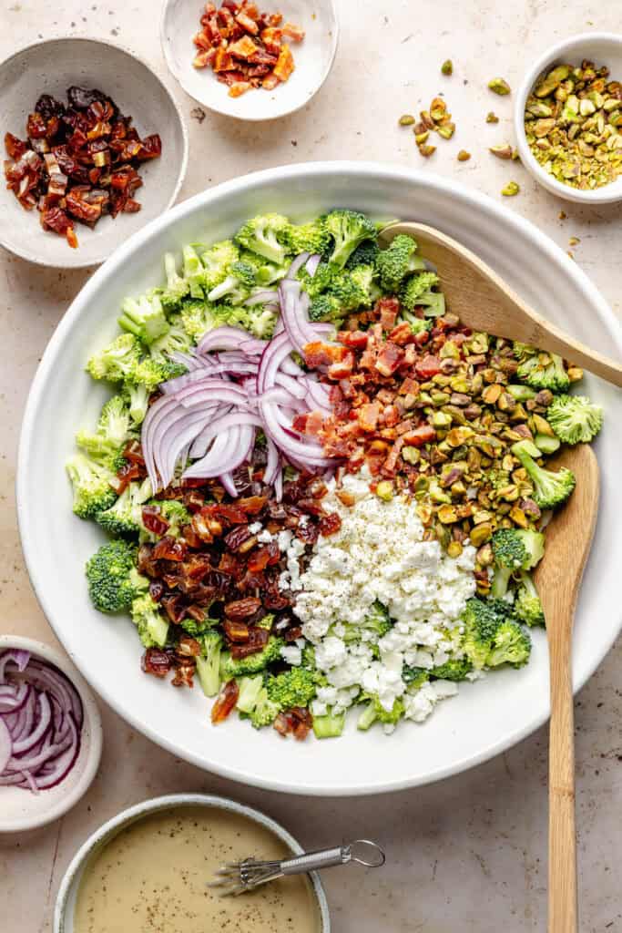 salad ingredients in mixing bowl