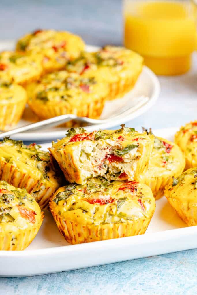 roasted red pepper egg bites with kale on plate