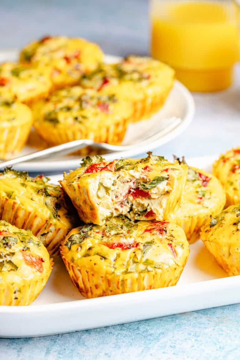 roasted red pepper egg bites with kale on plate