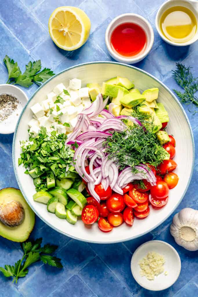 salad ingredients in a large mixing bowl